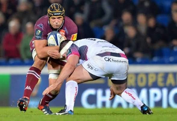 Berend Botha carrying the ball into a tackle